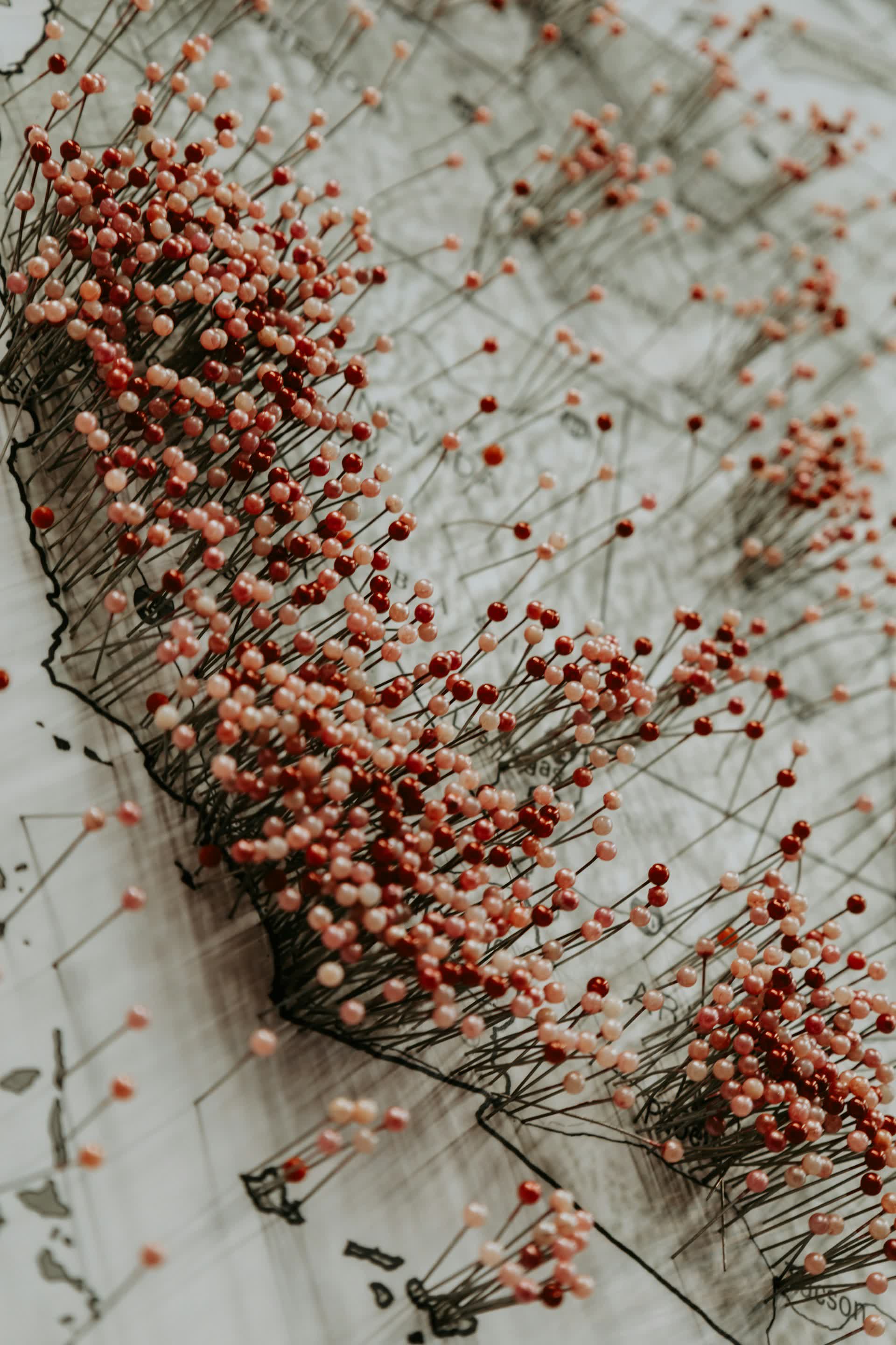 A US map with pins, representing Iron Ridge Advisors' nationwide reach across landowner clients and DST sponsors
